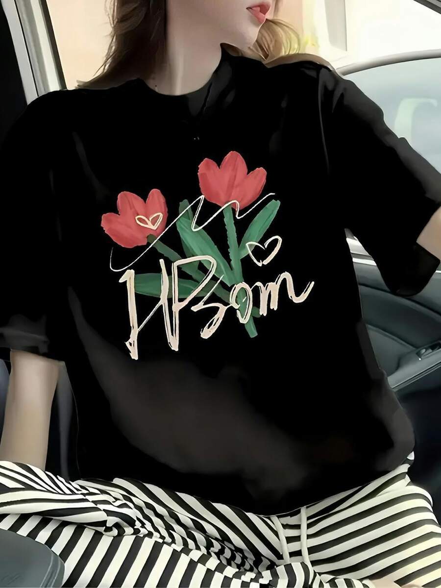 Dos flores rojas que representan amor vitalidad y energía acompañadas de hojas verdes que simbolizan esperanza y crecimiento en la vida camiseta de mujer casual moderna cómoda para uso diario - Negro - Ver 1