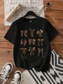 Lazos con patrón de leopardo que simbolizan fuerza elegancia y espíritu libre transmitiendo una energía salvaje y confianza interior camiseta de mujer casual moderna cómoda para uso diario - Negro - Ver 8
