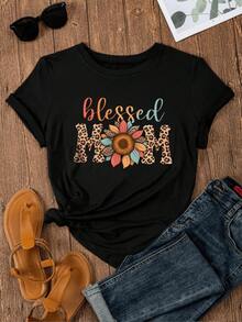 Flor con pétalos multicolores y patrones de leopardo rodeando la palabra blessed mom símbolo de amor energía y gratitud para madres que inspiran camisetas de mujer casual cómoda y moderna para uso diario - Negro - Ver 1