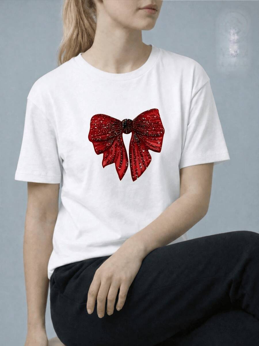 Un lazo rojo brillante formado por pequeñas piedras que reflejan la luz representando elegancia y energía con un toque festivo ideal para expresar confianza y alegría camiseta de mujer cómoda y moderna - Blanco - Ver 1