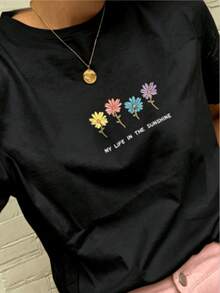 Cuatro flores de colores que simbolizan la alegría la vitalidad y la conexión con la luz del sol transmitiendo energía positiva camiseta de mujer casual moderna y cómoda para uso diario - Negro - Ver 8