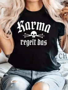Texto vibrante con calavera que simboliza la fuerza del karma y la idea de equilibrio universal transmitiendo un mensaje de actitud poderosa y confianza camiseta de mujer casual cómoda para uso diario - Negro - Ver 1
