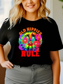 Símbolo psicodélico de paz rodeado de flores multicolor que representa libertad amor alegría unión espiritual y conexión con la naturaleza camiseta de mujer moderna casual cómoda y llamativa - Negro - Ver 1