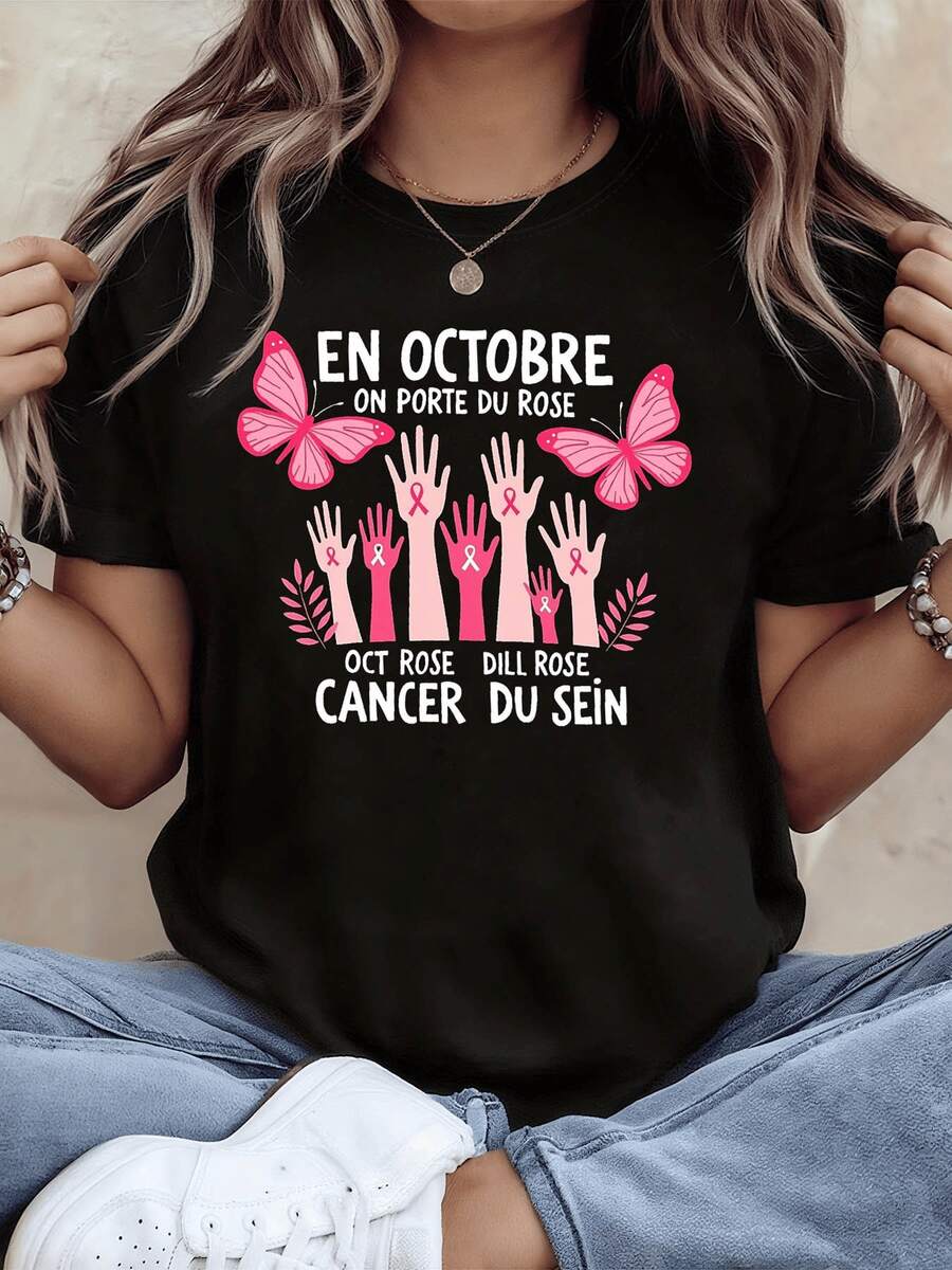 Manos levantadas con lazos rosados y mariposas simbolizan fuerza esperanza y unión en la lucha contra el cáncer de mama demostrando apoyo y conciencia durante octubre camiseta de mujer cómoda y moderna - Negro - Ver 1