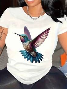 Colibrí de colores vibrantes que simboliza la libertad la esperanza y la alegría en pleno vuelo elegante camiseta de mujer ajustada casual moderna cómoda ideal para uso diario - Blanco - Ver 1