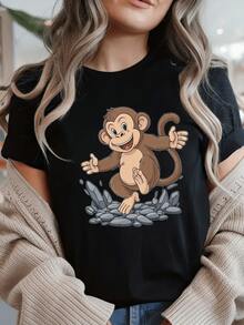 Mono alegre saltando sobre piedras mostrando energía curiosidad y simpatía con actitud juguetona que transmite felicidad y espíritu libre ideal para reflejar juventud y optimismo camiseta de mujer casual cómoda para uso diario - Negro - Ver 6