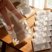 50/100/200 件装通用礼品袋套装，雏菊印花透明自粘小包装袋，非常适合婚礼回礼、生日茶会和小型礼品包装，全年适用，也可用于饼干烘焙的独立包装，是圣诞节的完美之选。 - 包裝袋 - 查看 1