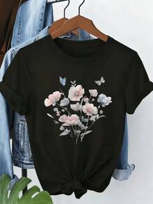 Soft Flowers And Delicate Butterflies Symbolizing Freedom And Harmony Against A Dark Background Convey Calm And Natural Beauty. A Modern, Comfortable, Casual Women's T-Shirt For Everyday Wear. - 黑色 - 查看 8