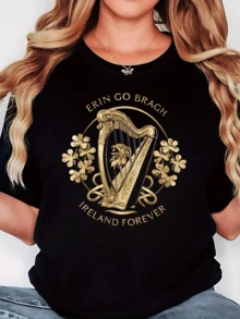 Símbolos dorados que representan la eterna conexión con Irlanda acompañados de un arpa tradicional rodeada de tréboles que evocan suerte y orgullo nacional camiseta de mujer moderna cómoda y elegante para uso diario - Negro - Ver 1