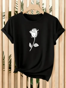 A White Rose With Leaves Symbolizes Purity And Sincere Love, Representing Inner Beauty And Peace Of Mind. Perfect For Conveying Serenity And Elegance On Any Occasion. A Modern, Comfortable, Casual Women's T-Shirt For Everyday Wear. - 黑色 - 查看 1