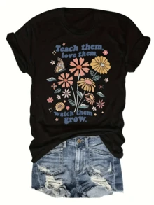 A Collection Of Colorful Flowers Alongside Butterflies Symbolizes Personal Growth And The Power Of Love, Conveying A Positive Message Of Care And Learning. A Comfortable, Casual Women's T-Shirt For Everyday Wear And Summer. - 黑色 - 查看 1