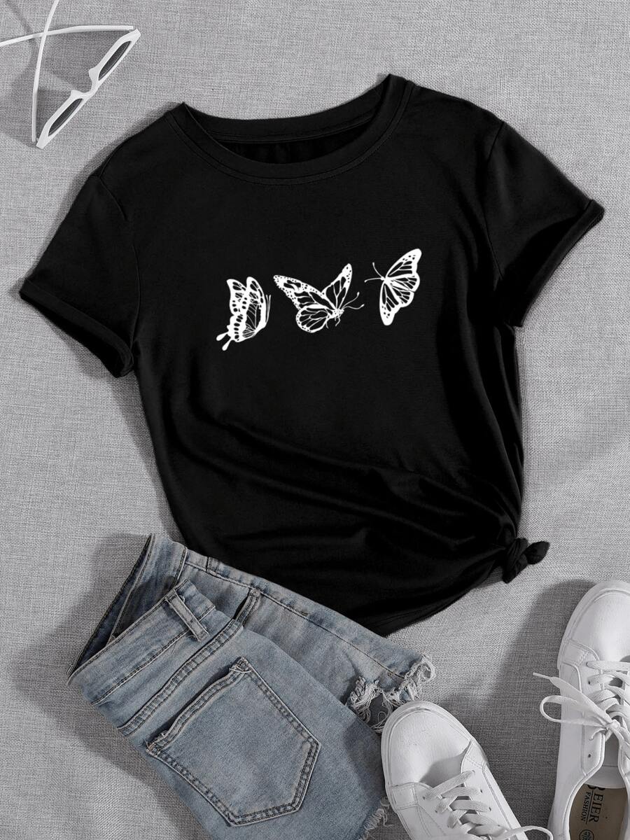 Three White Butterflies Represent Freedom, Transformation, And Beauty In Motion, Evoking A Connection With Nature And A Renewal Of The Spirit. A Modern, Casual Women's T-Shirt For Everyday Wear. - 黑色 - 查看 1