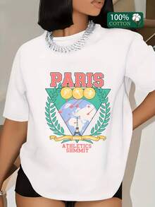 Symbol Of An Iconic City With Its Tower Reaching Towards The Sky, Surrounded By Green Leaves And Golden Medals That Evoke Sporting Energy And A Spirit Of Triumph. A Modern, Comfortable, And Attractive Women's T-Shirt For Casual Wear. - 白色 - 查看 1