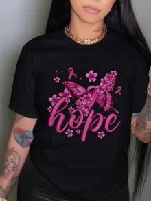 Pink Butterfly Surrounded By Flowers Symbolizing Hope And The Courageous Fight To Overcome Challenges. Comfortable Women's T-Shirt With Inspirational Print For Everyday Wear. - 黑色 - 查看 1