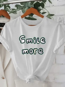 A Positive Message That Encourages You To Smile More, Conveying Joy And Optimistic Energy With Colorful Lettering That Inspires Good Spirits. Ideal For Casual Wear, This Comfortable And Modern Women's T-Shirt Is Perfect For Everyday Wear. - 白色 - 查看 8