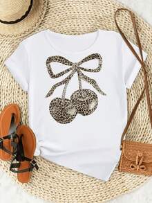 Two Cherries Formed By A Delicate Leopard Pattern Joined By A Large Bow Symbolize Coquetry, Freedom, And Cheerful Feminine Energy. A Modern, Casual Women's T-Shirt For Everyday Wear. - 白色 - 查看 8