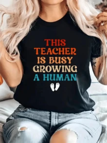 Text With A Fun Message Celebrating A Pregnant Teacher, Showing Pride In Her Dual Role As Educator And Mother, With A Tender Touch Of Baby Footprints. Casual, Comfortable, And Modern Women's T-Shirt, Perfect For A Special Gift. - 黑色 - 查看 6