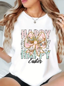 A Large Pastel Bow Adorned With Decorated Eggs, Soft Flowers, And An Adorable Bunny Celebrates The Joy And Rebirth Of Easter, Conveying Happiness And Tenderness. This Comfortable, Casual Women's T-Shirt Is Perfect For Joyful Days. - 白色 - 查看 1