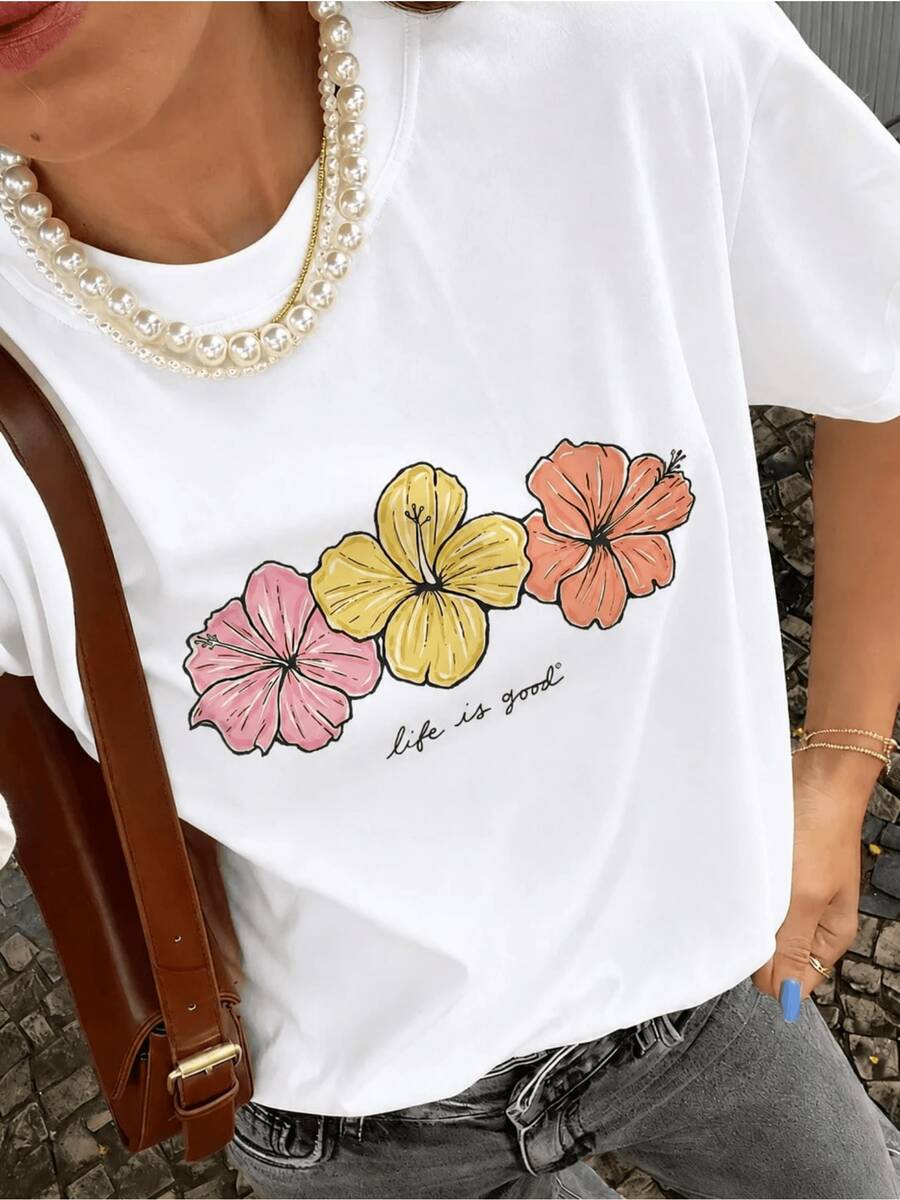 Three Tropical Flowers In Shades Of Pink, Yellow, And Orange Reflect Joy, Vitality, And Positive Energy, Conveying An Optimistic Message Of Love For Life. This Comfortable, Casual Women's T-Shirt Is Perfect For Everyday Wear. - 白色 - 查看 1