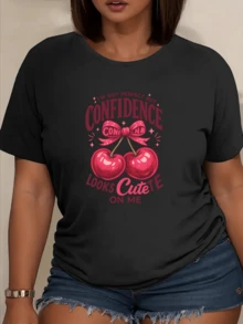 Two Cherries Joined By A Pink Ribbon Symbolize Sweetness, Confidence, And Joy, Conveying A Positive Message Of Self-Love And Modern Charm. This Comfortable And Attractive Casual Women's T-Shirt Is Perfect For Summer. - 黑色 - 查看 1