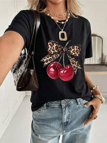 Two Bright Red Cherries Joined By A Leopard-Print Ribbon Symbolize Energy, Passion, And Elegance On A Modern, Casual Women's T-Shirt Ideal For Everyday Wear And Social Outings. - 黑色 - 查看 8