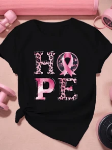 Pink Ribbon Symbolizing Hope And Strength In The Fight Against Cancer, With Lettering Decorated In An Animal Pattern And A Pink Background. Casual, Comfortable, And Modern Women's T-Shirt. - Black - View 8