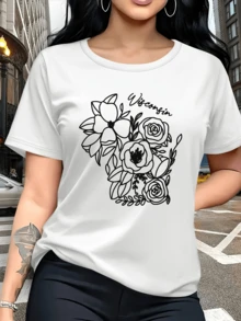 Flores entrelazadas que simbolizan la conexión con la naturaleza y la serenidad del alma femenina con líneas suaves y palabra  evocando libertad y calma camiseta de mujer casual moderna cómoda para diario - Blanco - Ver 1