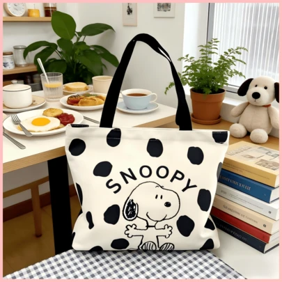 SNOOPY 1个史努比黑色帆布手提包，大容量单肩包，适合日常通勤和旅行，是送给朋友的完美生日、节日和开学礼物。