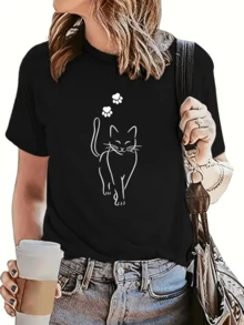 A Cat Walking With Paw Prints Above Its Head Symbolizes Independence, Elegance, And Serenity-Perfect For Reflecting A Love For Animals And Free Energy. A Comfortable, Casual Women's T-Shirt For Everyday Wear. - 黑色 - 查看 8