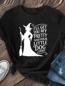 An Elegant Witch Figure Holding A Broomstick, Accompanied By A Fun Phrase That Inspires Confidence, Independence, And A Touch Of Mystery-Ideal For Expressing A Unique Personality. A Modern, Casual Women's T-Shirt. - 黑色 - 查看 1