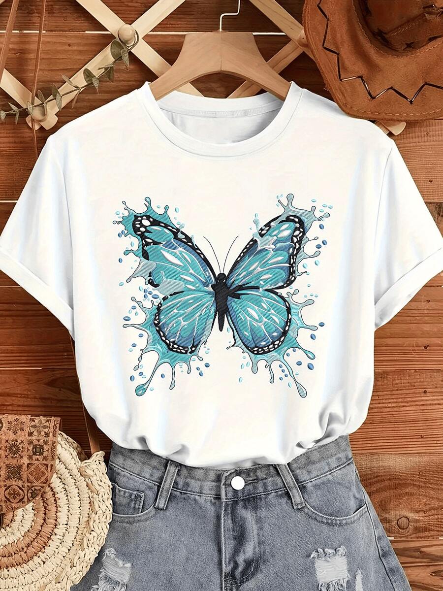 Mariposa azul con alas extendidas que simboliza libertad transformación y energía positiva rodeada de destellos de agua en movimiento camiseta de mujer casual cómoda para uso diario - Blanco - Ver 1