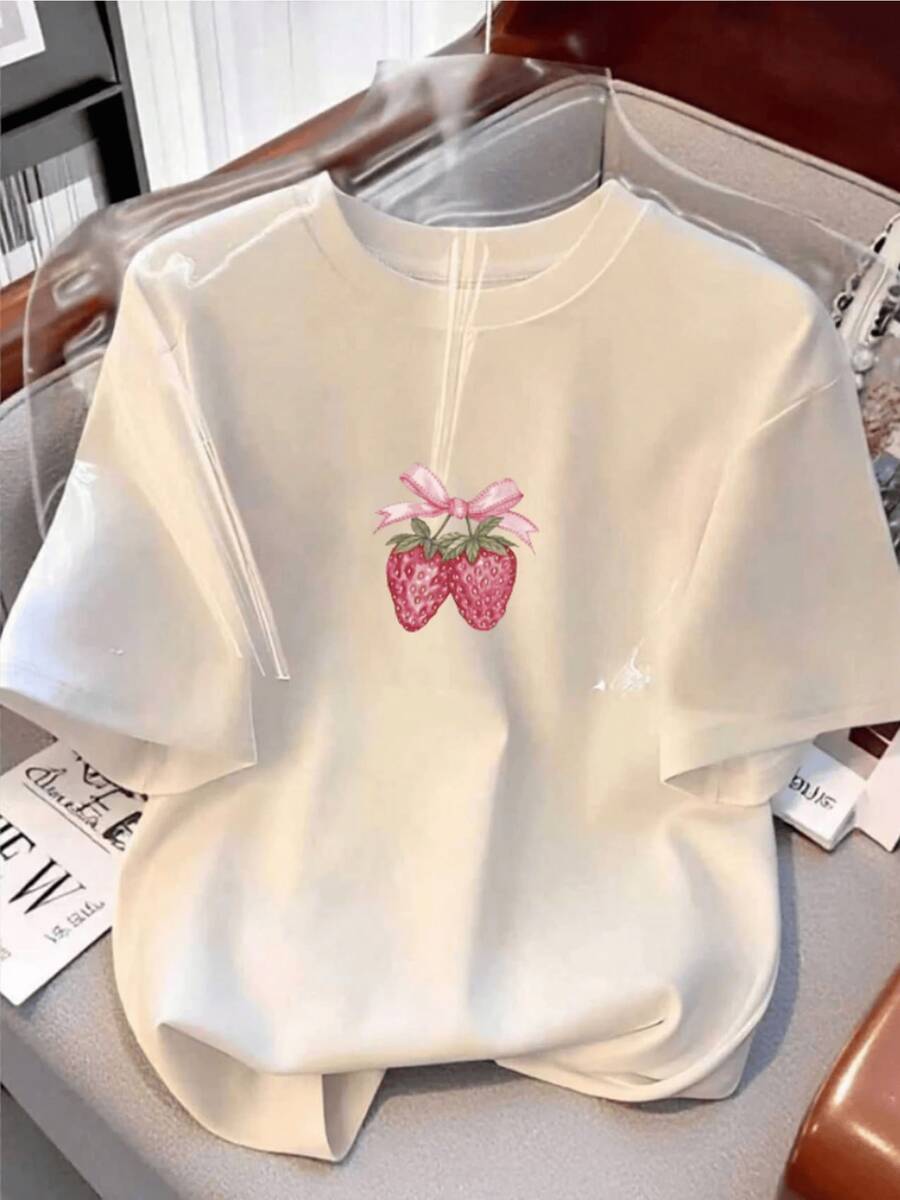 Pink Strawberries With A Ribbon Symbolize Tenderness, Sweetness, And Summer Freshness, Adding A Charming, Innocent, And Feminine Touch To This Casual And Comfortable Women's T-Shirt, Perfect For Everyday Wear. - Putih - View 1