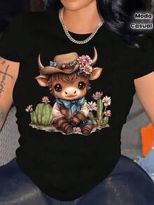 Cute Little Cow Wearing A Cowboy Hat Surrounded By Colorful Flowers And Desert Cacti Conveying A Free And Charming Spirit. Comfortable, Modern Casual Women's T-Shirt For Everyday Wear. - 黑色 - 查看 1
