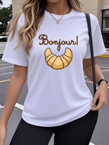Golden Croissant With A Cheerful French Greeting That Conveys Positive Energy And Parisian Charm, Ideal For Women Who Love Casual Fashion; Comfortable And Modern Women's T-Shirt - 白色 - 查看 1