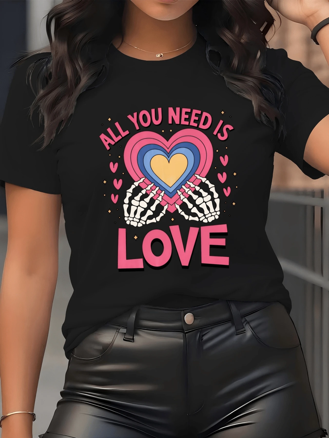 Multicolored Hearts Held By Bone Hands Symbolize The Union Between Life And Eternal Love In A Vibrant Artistic Expression. This Modern, Comfortable, Casual Women's T-Shirt Is Perfect For Everyday Wear. - 黑色 - 查看 1