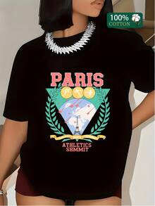 Symbol Of An Iconic City With The Tower Rising Towards The Sky Surrounded By Green Leaves And Golden Medals That Evoke Sporting Energy And A Spirit Of Triumph. Modern, Comfortable, And Attractive Women's T-Shirt For Casual Wear - 黑色 - 查看 1