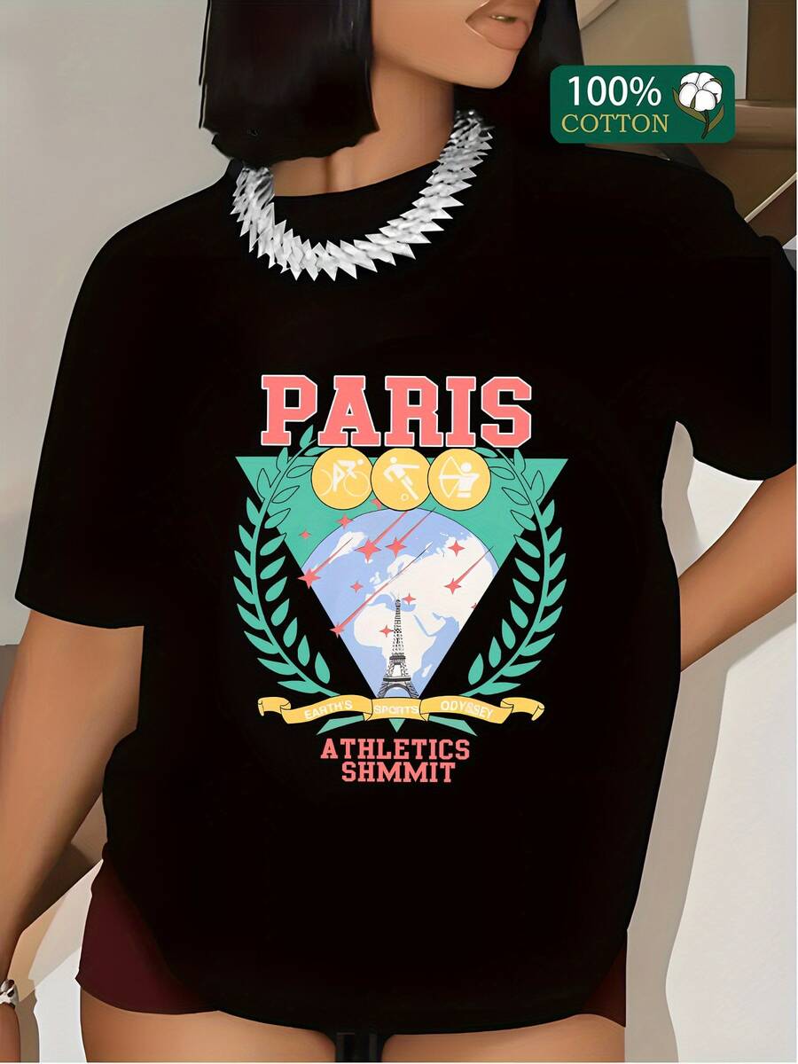Symbol Of An Iconic City With The Tower Rising Towards The Sky Surrounded By Green Leaves And Golden Medals That Evoke Sporting Energy And A Spirit Of Triumph. Modern, Comfortable, And Attractive Women's T-Shirt For Casual Wear - 黑色 - 查看 1