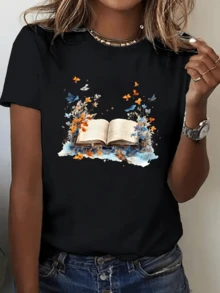 Open Book Surrounded By Orange And Blue Butterflies Emerging From Its Pages Alongside Luminous Flowers Symbolizing Freedom, Imagination, And The Blossoming Of Knowledge. Modern Casual Women's T-Shirt Perfect For Everyday Wear - 黑色 - 查看 1