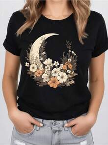 A Crescent Moon Surrounded By Warm Flowers Symbolizes Harmony, Inner Growth, And Connection With Nature In A Soft And Relaxed Artistic Style. A Stylish And Comfortable Women's T-Shirt For Everyday Wear And Casual Moments. - 黑色 - 查看 8