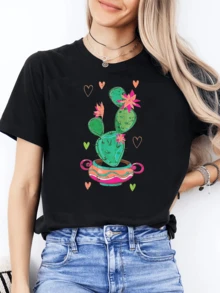 Cactus sonriente con flores rosadas y corazones que simbolizan alegría esperanza y amor a la naturaleza camiseta de mujer - Negro - Ver 1