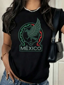 A Symbol Of National Strength With Raised Wings And Green, Red, And White Colors That Celebrate Mexican Passion With Modern Energy. A Comfortable And Stylish Women's T-Shirt For Everyday Wear. - 黑色 - 查看 1
