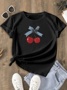 Two Bright Red Cherries Joined By A Blue Ribbon Symbolize The Sweetness Of Summer, Joy, And The Fresh Energy Of The Day. A Comfortable, Casual Women's T-Shirt, Ideal For Everyday Wear. - 黑色 - 查看 6