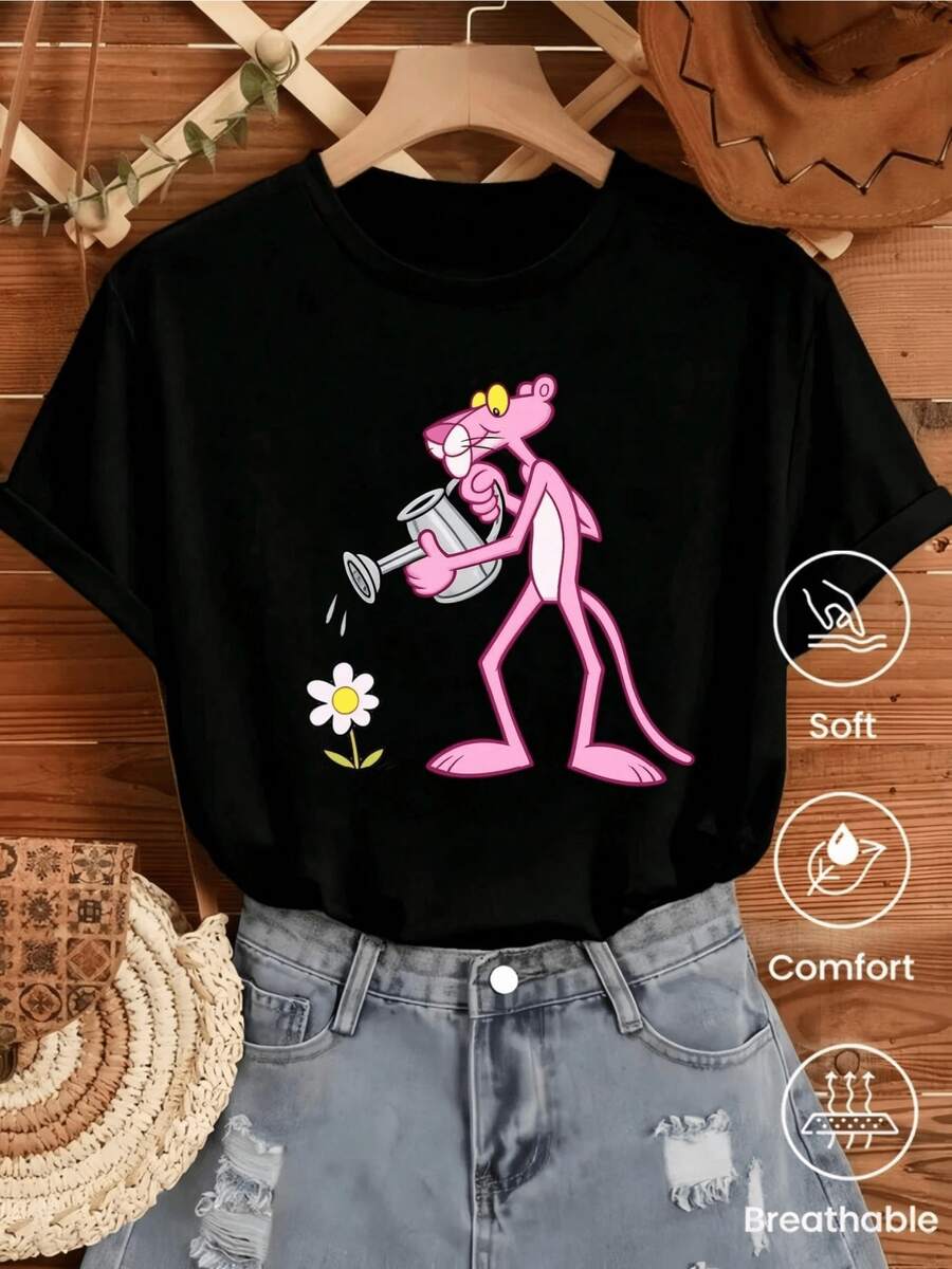 A Cheerful Pink Feline Figure Watering A Small White Flower Symbolizes Care, Tenderness, And Hope In The Small Details. A Comfortable And Breathable Casual Women's T-Shirt For Everyday Wear. - 黑色 - 查看 1