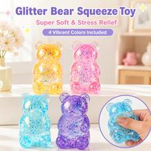 Questo giocattolo anti-stress a forma di orsetto in cristallo glitterato è un giocattolo a lento rimbalzo. La sua consistenza morbida ed elastica aiuta ad alleviare l'ansia ed è perfetto come regalo per il lavoro, lo studio, le feste o le vacanze, aiutando a ridurre lo stress. - Multicolore - Visualizzare 1