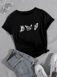 Tres mariposas blancas que simbolizan la libertad el cambio y la belleza natural extendiendo sus alas en vuelo armonioso camiseta de mujer casual cómoda moderna y versátil para uso diario - Negro - Ver 1