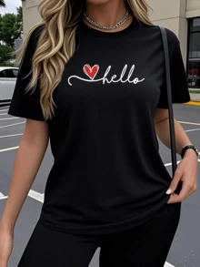 A Red Heart Symbolizing Affection And An Optimistic Greeting, Accompanied By A White Stroke Forming The Word "Hello," Evokes Positive Energy And Casual Charm. A Comfortable, Modern Women's T-Shirt For Everyday Wear. - 黑色 - 查看 6