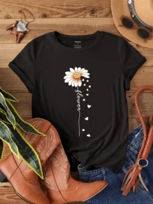 A White Daisy With Petals Falling In The Shape Of Hearts Symbolizes Love, Hope, And Freshness, Recalling The Simple Beauty Of Nature. A Comfortable And Stylish Casual Women's T-Shirt For Everyday Wear. - 黑色 - 查看 8
