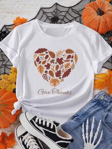 Heart Formed By Autumn Leaves In Warm Tones That Symbolize Gratitude And Renewal, Conveying Serenity And Connection With Nature. Women's T-Shirt With The Message "Give Thanks," Ideal For Everyday Wear. - 白色 - 查看 6