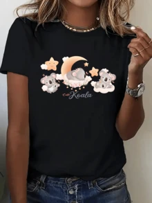 Koalas Sleeping On A Golden Moon Surrounded By Stars And Soft Clouds Convey Tenderness And Calm, Perfect For Those Who Love Animals And Dreams. This Casual Women's T-Shirt With A Charming Print Is Ideal For Everyday Wear. - 黑色 - 查看 1