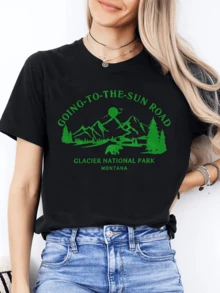 Majestic Mountains With A Road That Climbs Towards The Sun Through Pine Trees And A Bear That Represents The Natural Force Of Glacier  Park. Comfortable Casual Women's T-Shirt For Everyday Wear - 黑色 - 查看 6